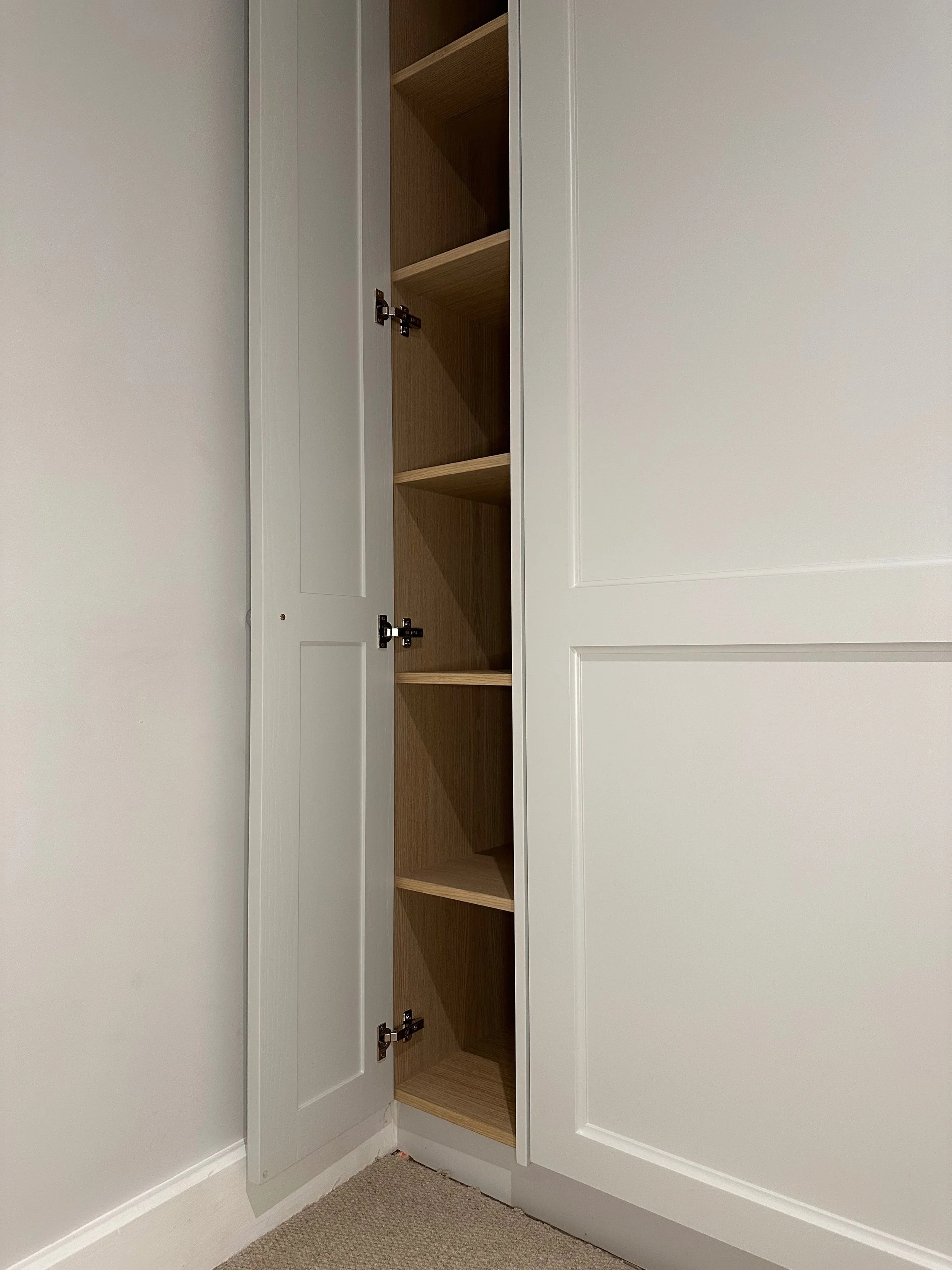 This smart Murphy bed design transformed an underused cottage room into a dual-purpose space, crafted with care and cleverness in every detail.