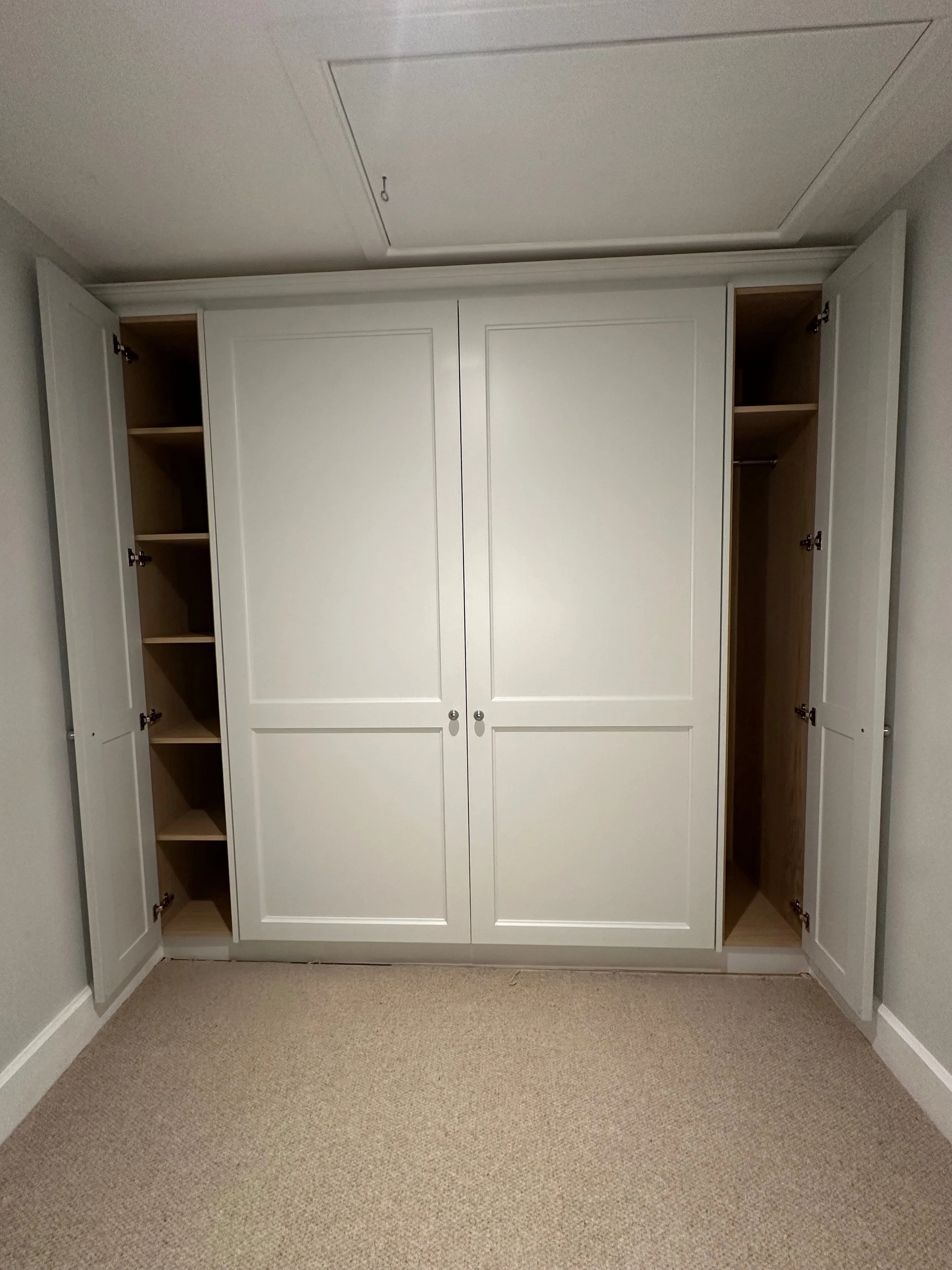 This smart Murphy bed design transformed an underused cottage room into a dual-purpose space, crafted with care and cleverness in every detail.