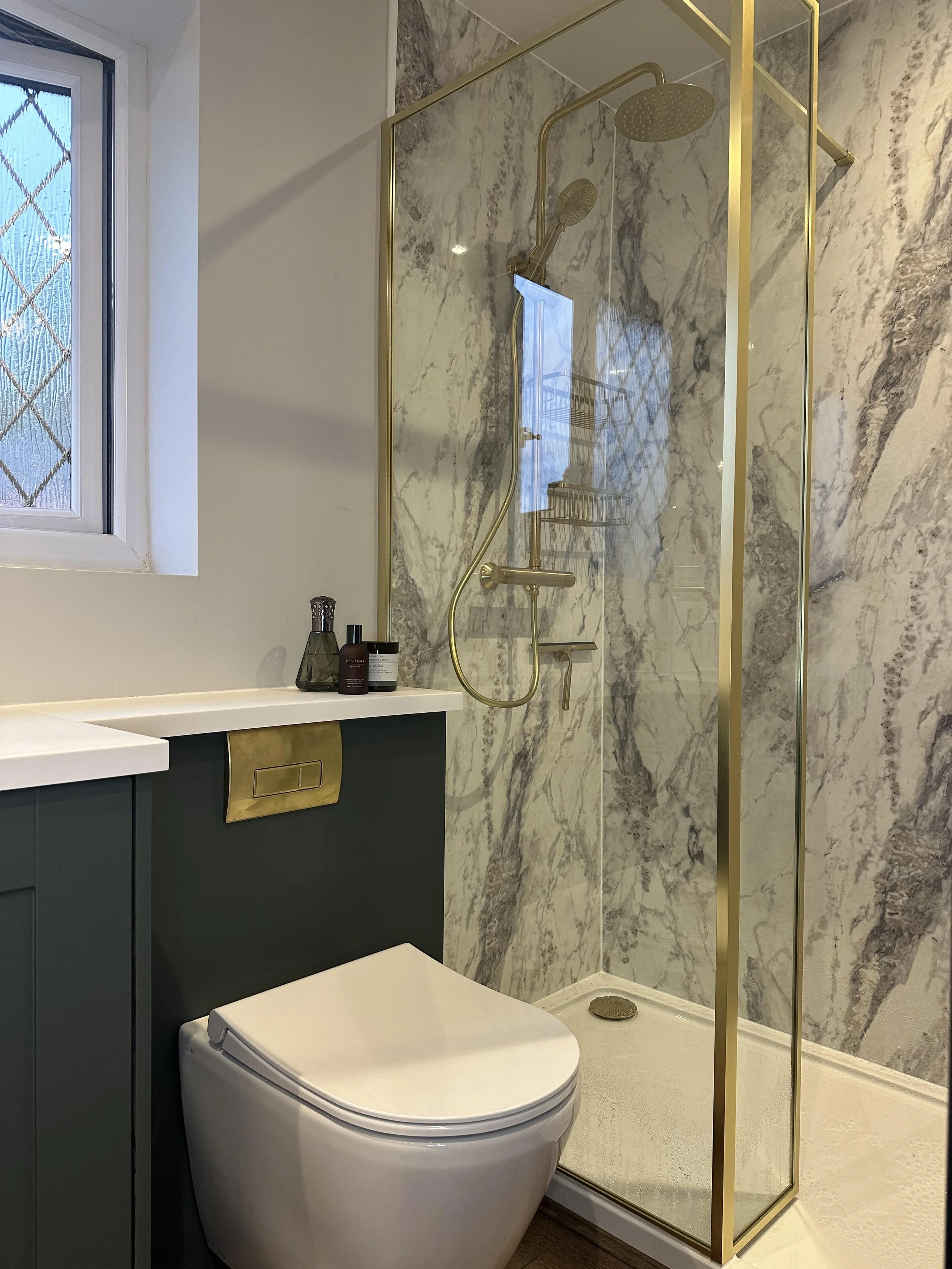 This dreamy bathroom for Sarah & JP blends luxury, warmth, and functionality—proof that with the right team, even the most ambitious vision can come to life.