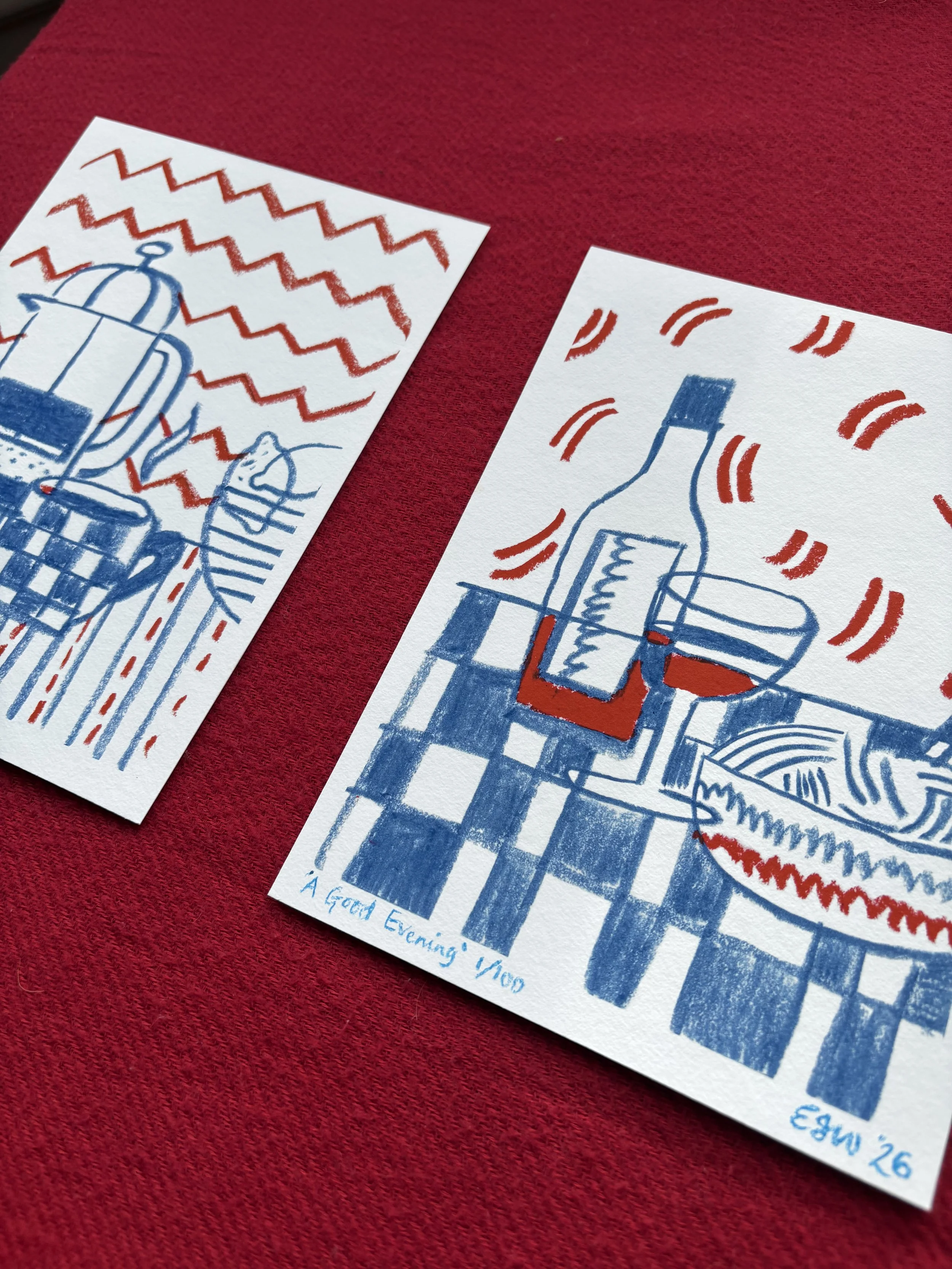 Two limited edition fine art prints by artist Emma Winterschladen, with naive oil pastel drawings of a wine glass and a bowl of spaghetti, featuring red zigzag and semi-circle patterns, placed on a red check surface, and a drawing of a coffee pot