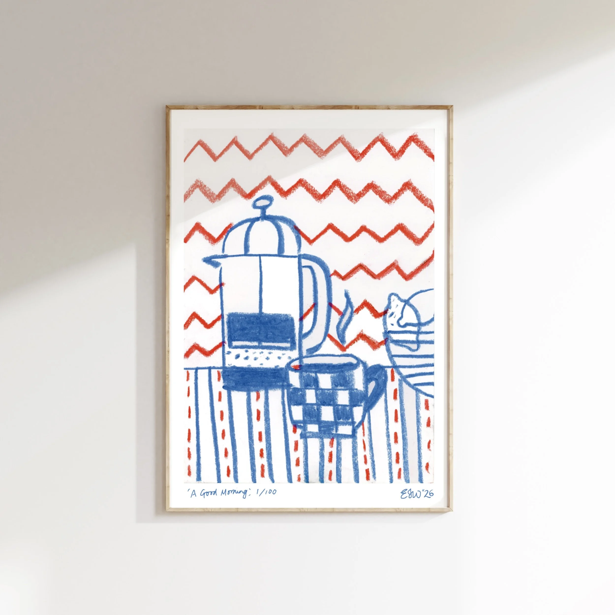 Framed limited edition fine art print by Emma Winterschladen on a wall featuring a naiveline drawing of a blue teapot and a few cups, with a background of red zigzag lines, and the handwritten caption 'A Good Morning'.