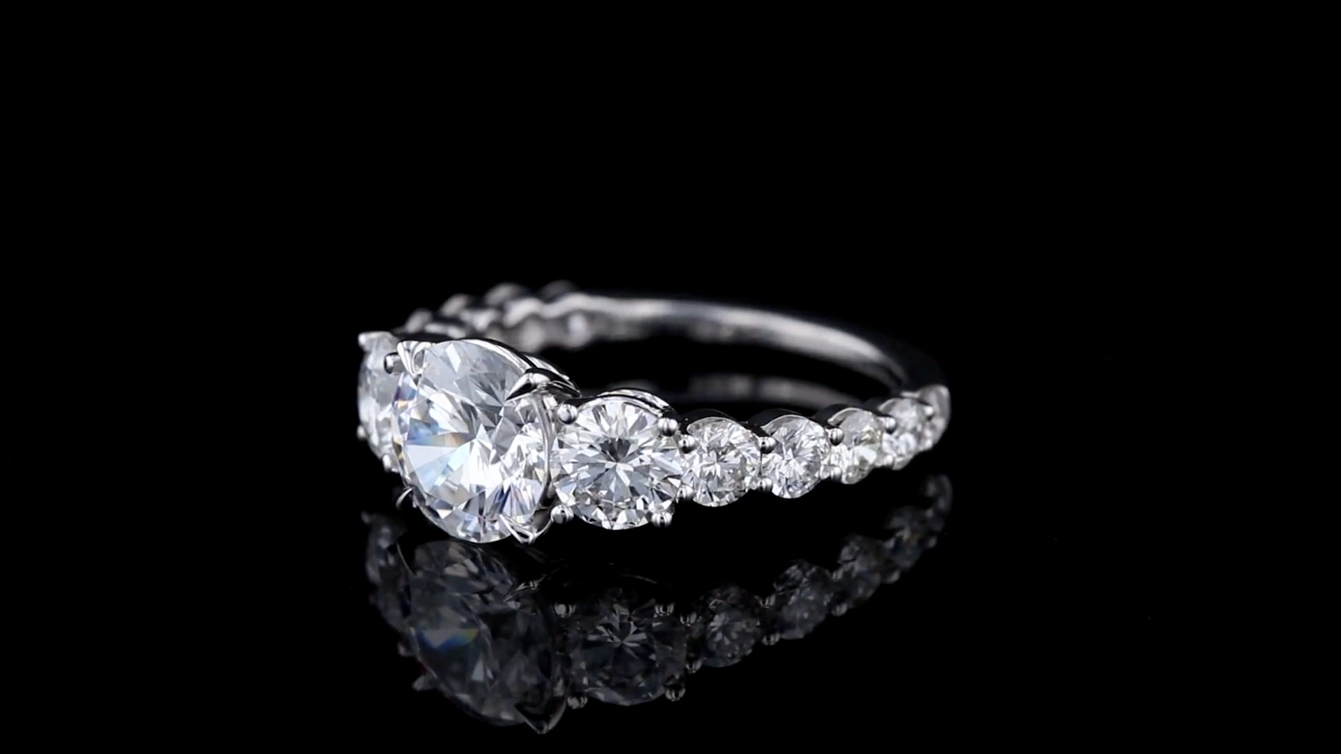 z1011903-1011903---3-Stone-Round-Engagement-Ring-With-Shared-Prong-Setting---Left-UPDATED.png