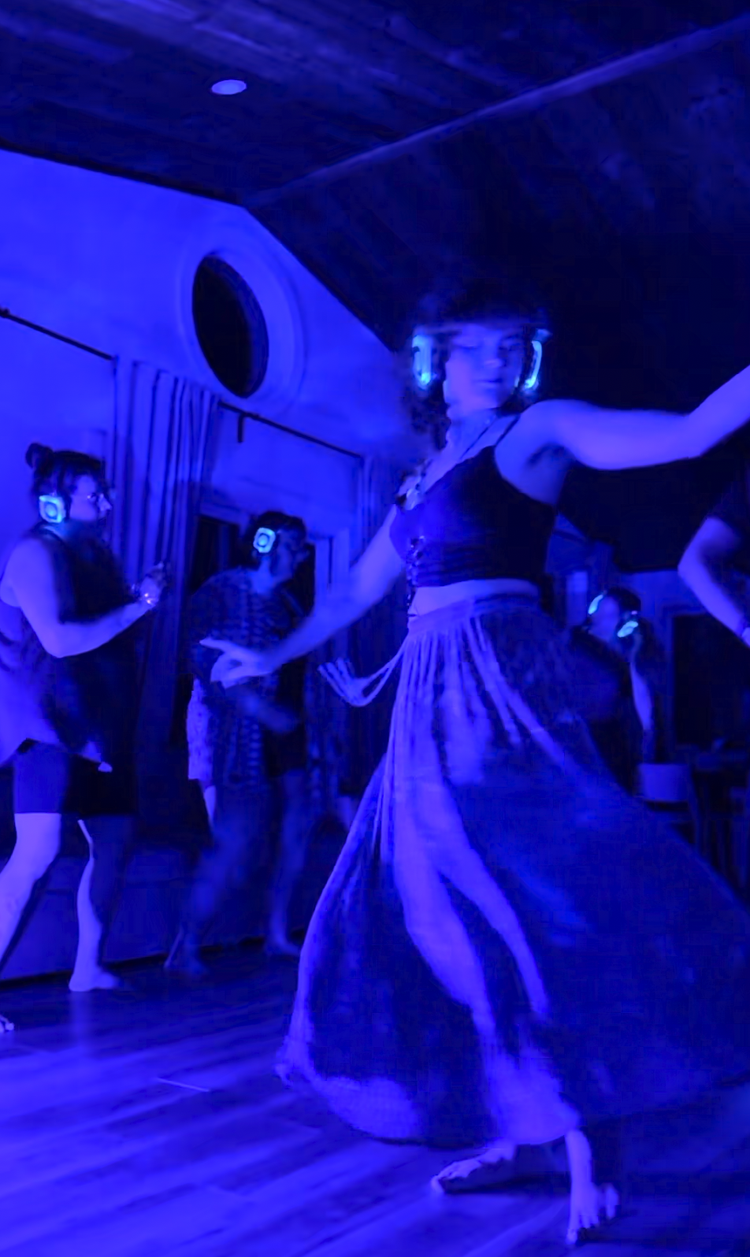 luna dancing with the group at the silent disco