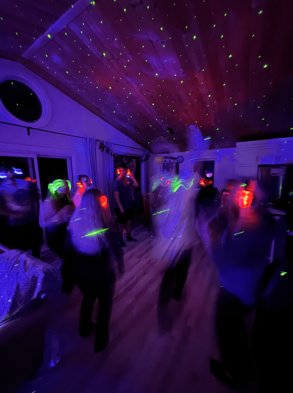 everyone dancing inside the beach house