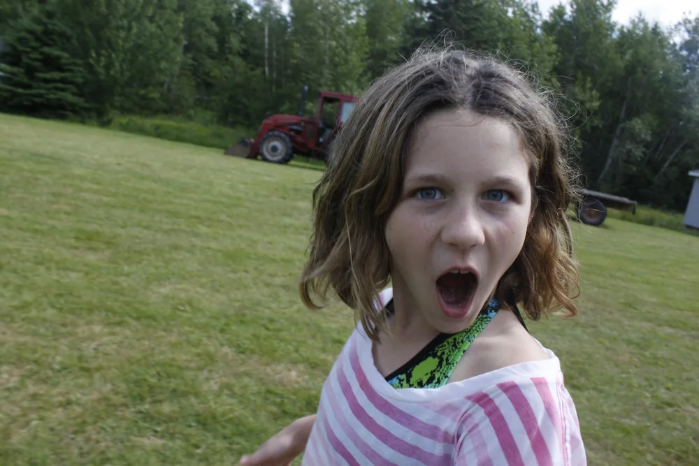 kiana as a child at camp pagweak, years before becoming a koulu yoga school graduate