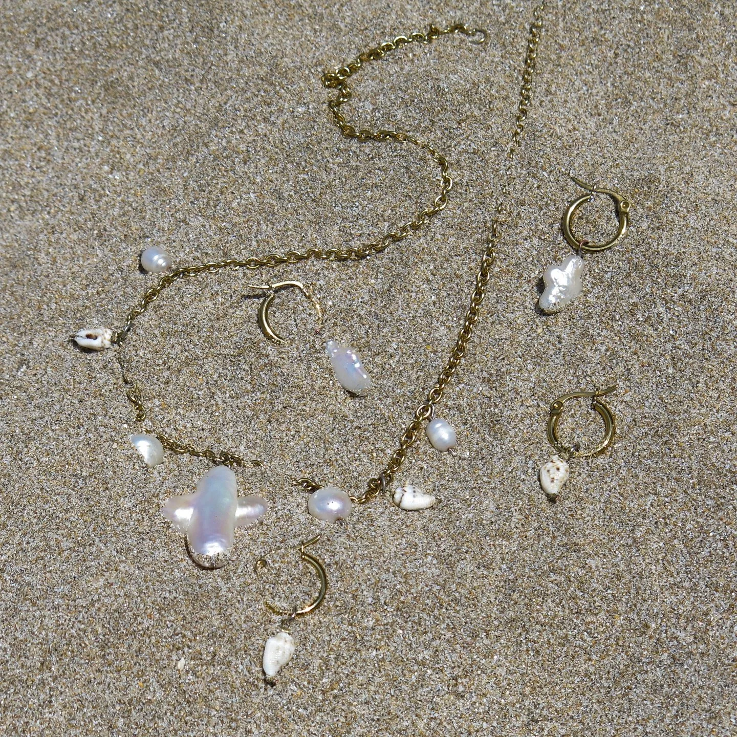 Created by the ocean - designed to never leave it 🩵
Surf, sweat, swim, shower &amp; repeat 
-
18k gold plated jewels that stay luminous through salt &amp; sun