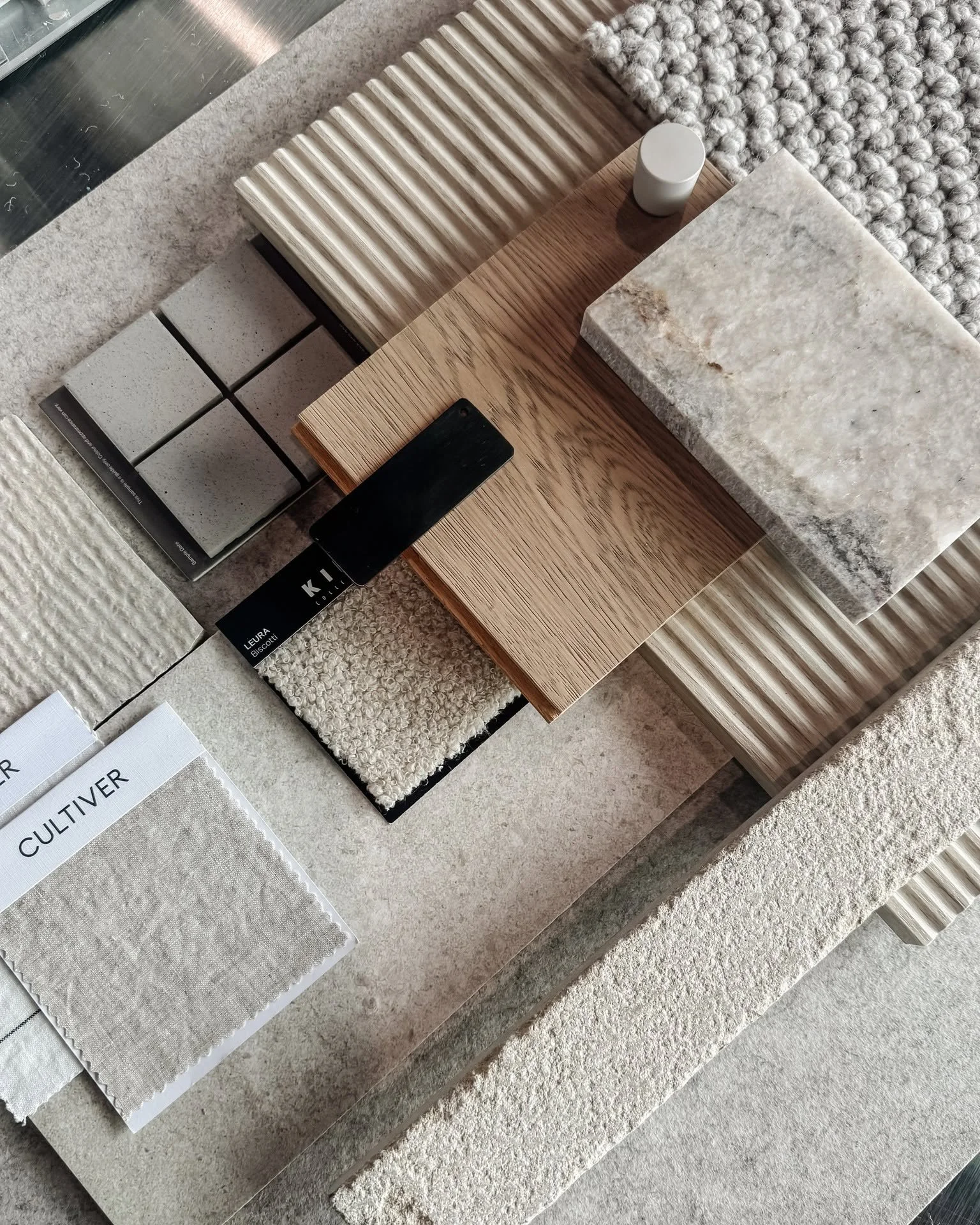 Neutral never looked so good! 
We&rsquo;ve been playing with layers and textures for this new renovation project. The result is a scheme that feels warm and timeless but also, elevated. Think creamy stone paired with rippled tiles, oak timber, boucle