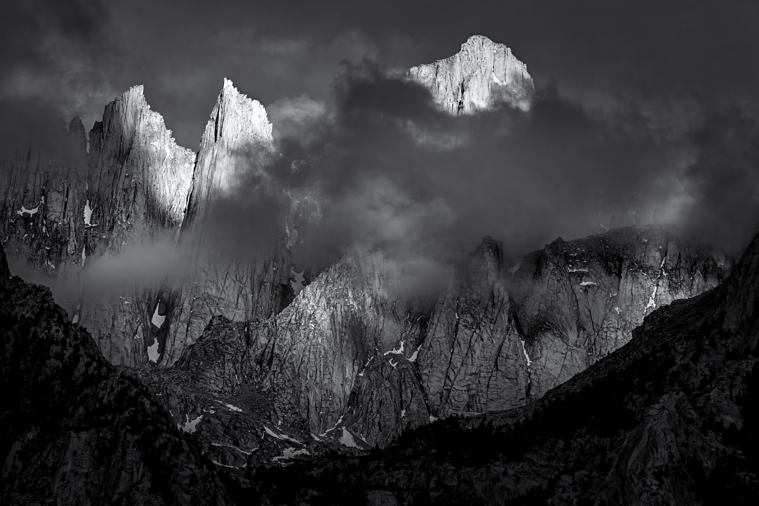 "First Light on Whitney"

First morning light breaking through clearing storm clouds over Mt. Whitney, Alabama Hills, CA