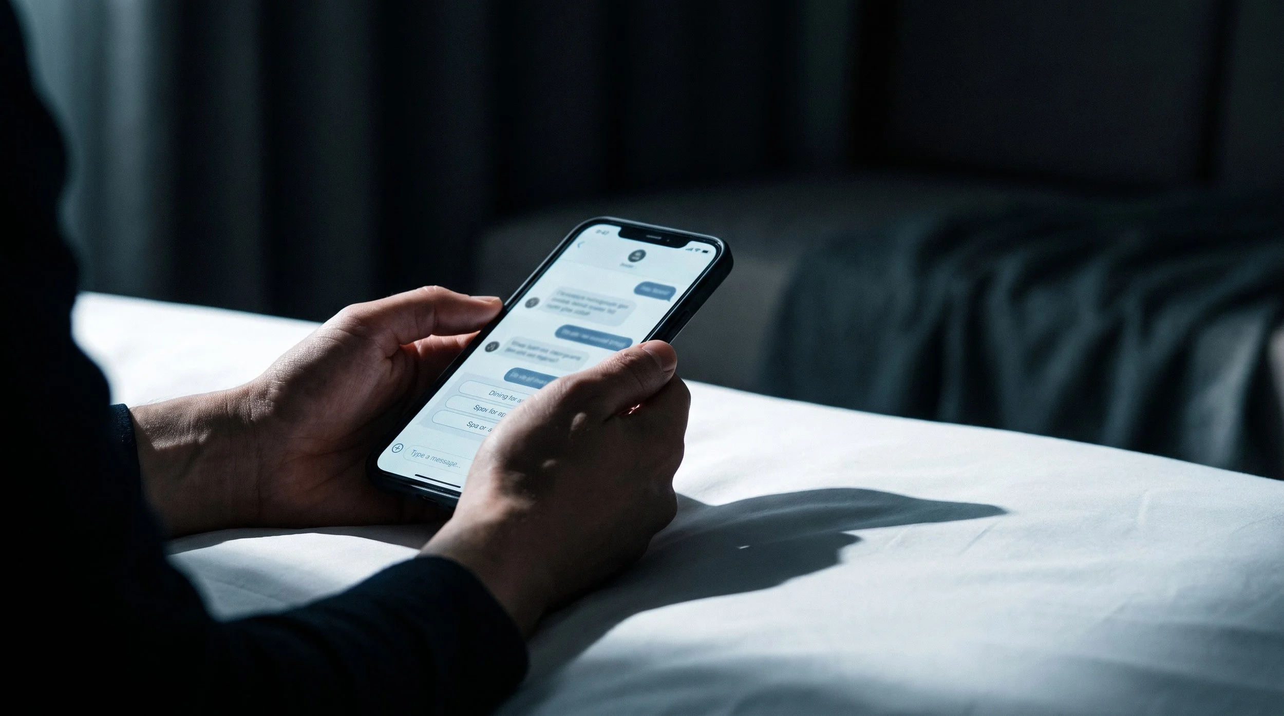 Hotel guest reading a personalised eConcierge message on their phone