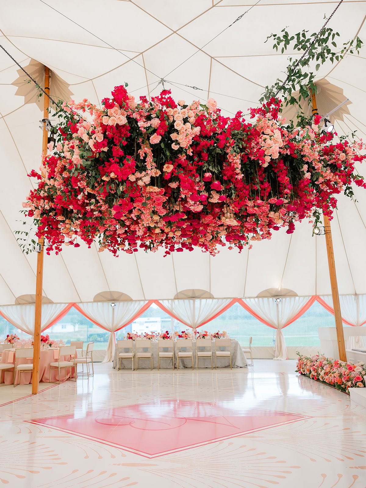 A celebration built on bold color, rich texture, and fearless design.⁠
⁠
We started with a warm, saturated palette: sunset pinks, golden tones, and hints of raspberry that reflected the bride&rsquo;s vivacious spirit. Every layer was intentional. 

C
