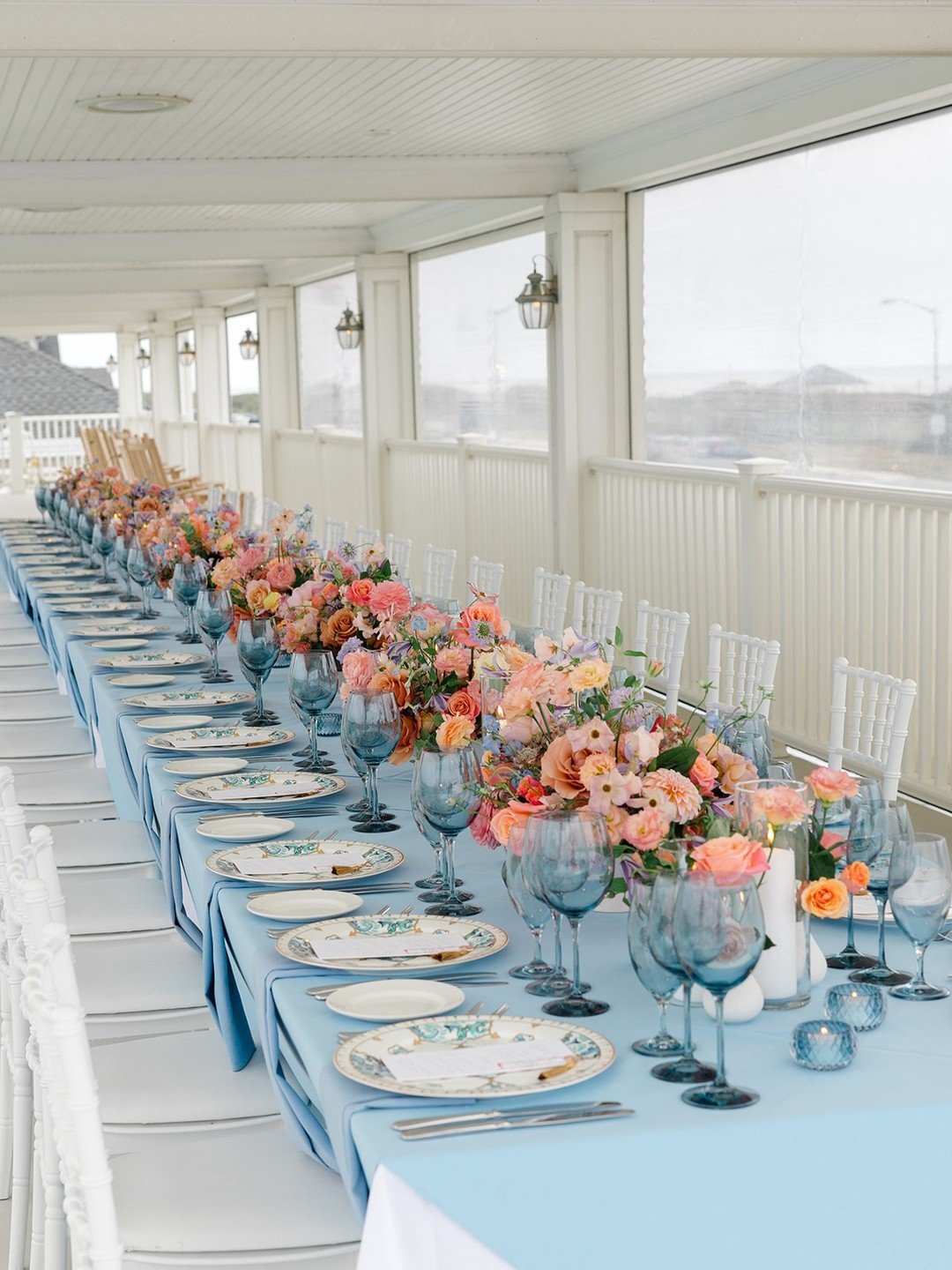 An intimate evening by the sea before their big day.

Inspired by the couple&rsquo;s love for the coast and color, the rehearsal dinner was full of charm and ease. Powder blue linens, painterly florals and sophisticated tabletop details created a set