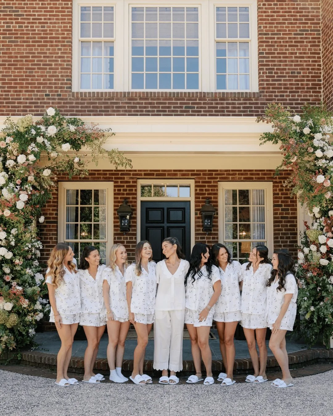 The morning started with her bridesmaids gathered around, helping with final touches, hyping her up, and taking in that first look together. She shared a quiet moment with her dad, then headed out to the car with the biggest smile, ready to get the d