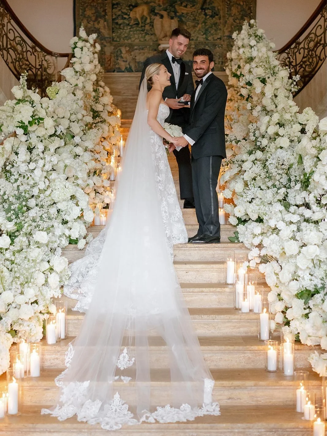 An ethereal garden, designed to feel as though it had taken over the space entirely.

Florals cascading with softness and movement, layered into candlelight and draping to create something lush, immersive, and quietly timeless.

Each detail placed to