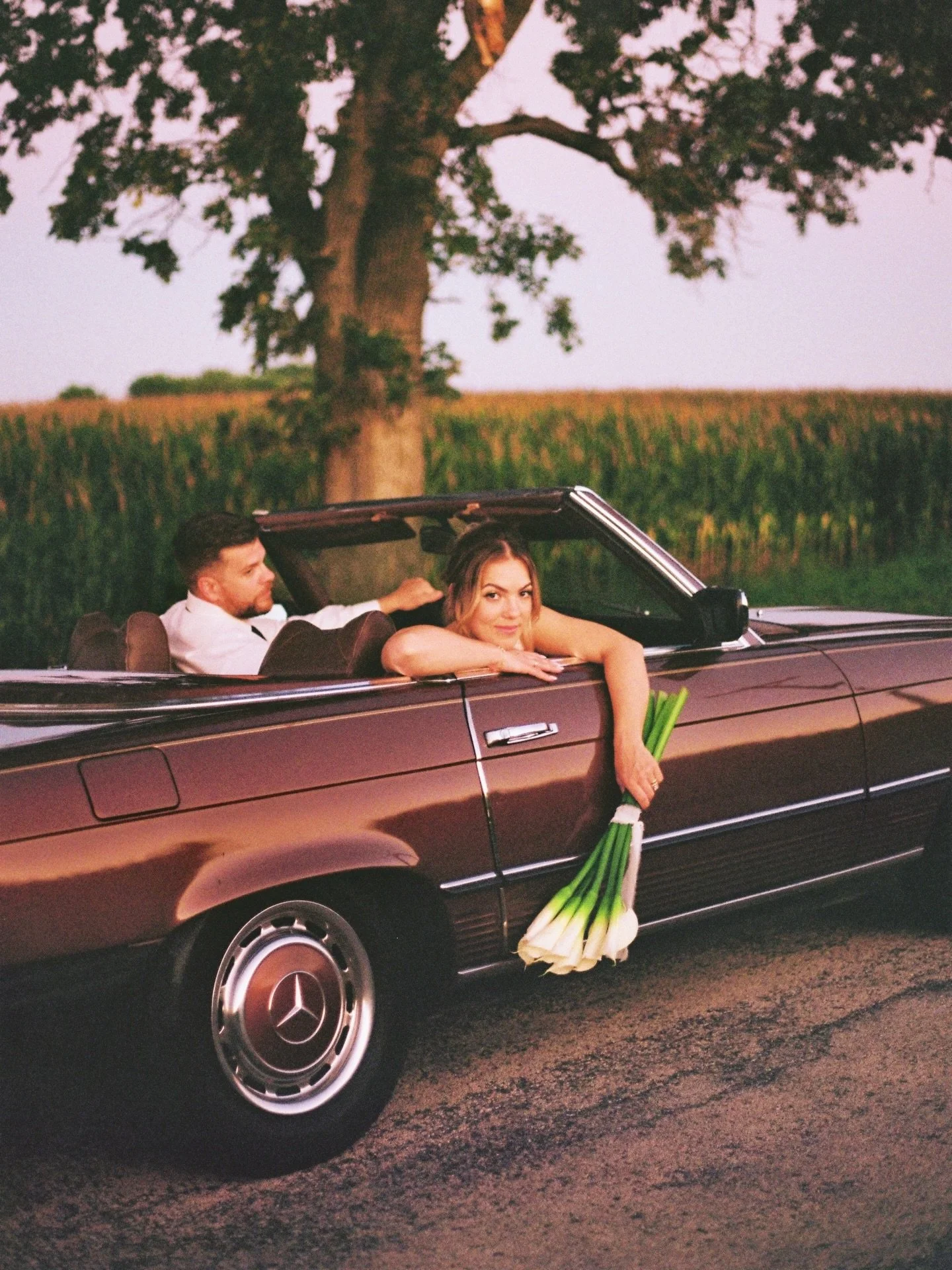 Be my getaway car babyyyy 🤎 film captures 🎞️ 2nd shot for @lindseycolephotography

#filmphotography #canonfilm #kodakportra #filmphotographer #couplesportraits