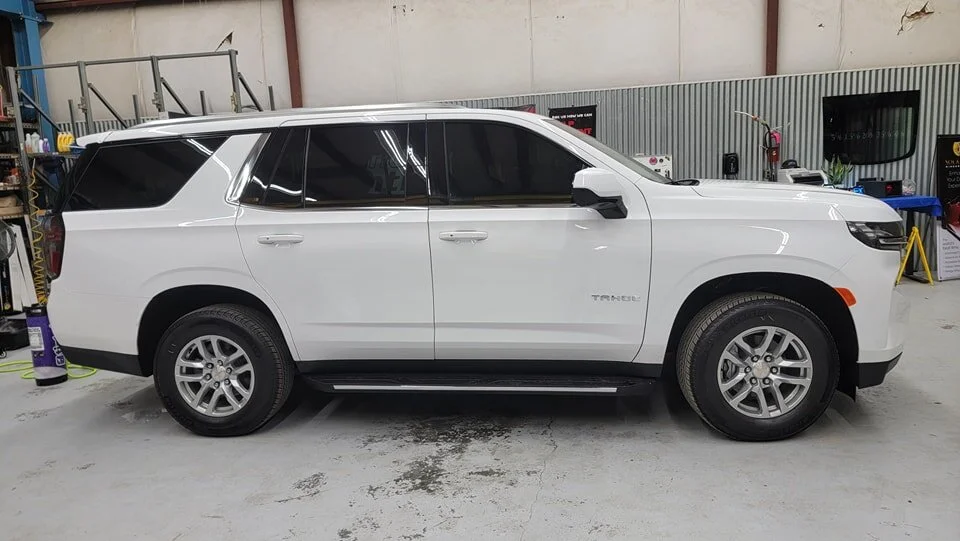 2023 Chevy Tahoe 
15% CarbonFX on the front door windows and a 5% AS1 sunstrip for the top of the windshield 👌