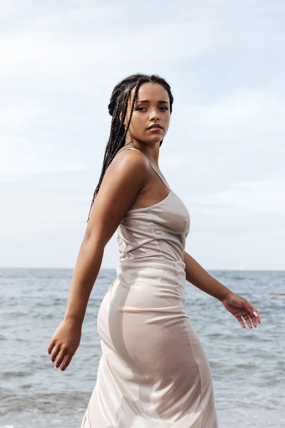 Self love and confidence photography session by Devon photographer in Plymouth, woman at the seaside.