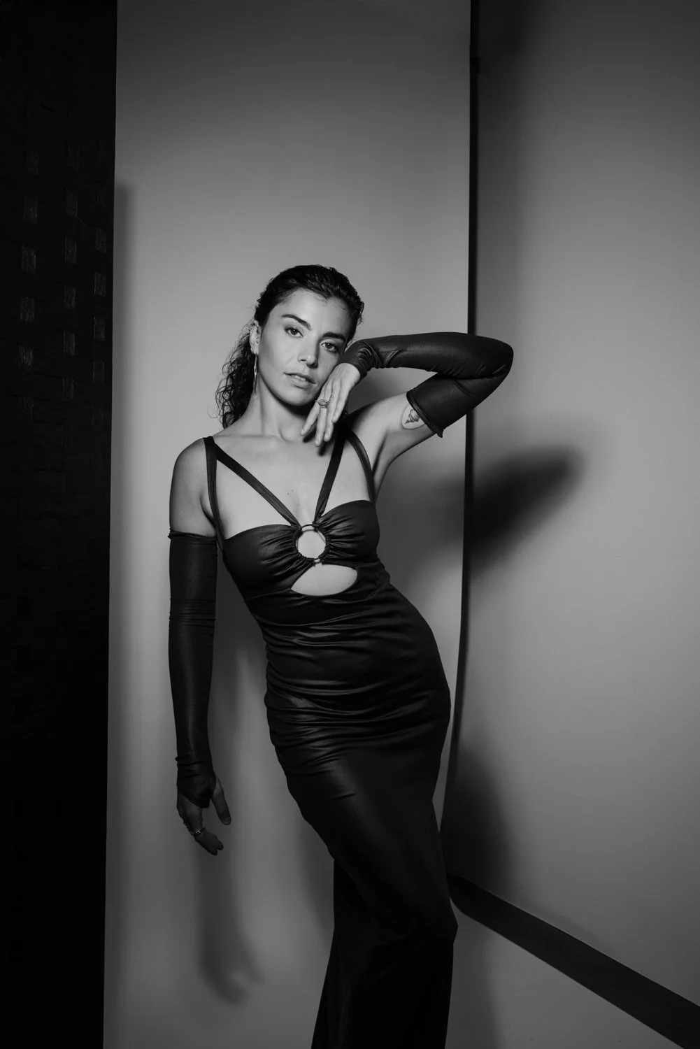 Woman posing for a self-love portrait session in a studio