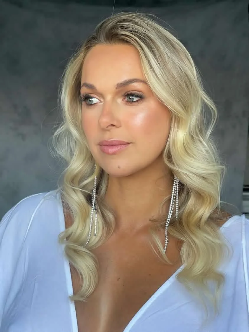 Studio and sunset portraits capture expecting mothers in styled outfits, professional hair & makeup, and timeless, memorable images.