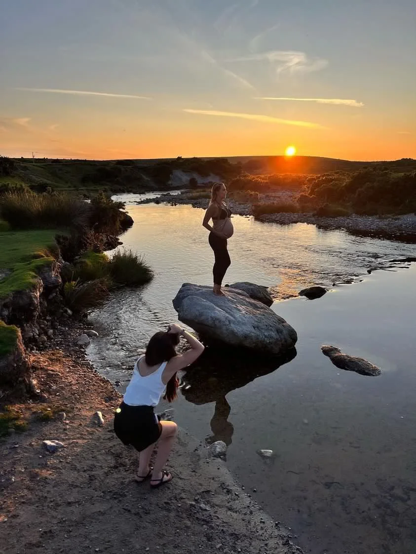 Studio and sunset portraits capture expecting mothers in styled outfits, professional hair & makeup, and timeless, memorable images.