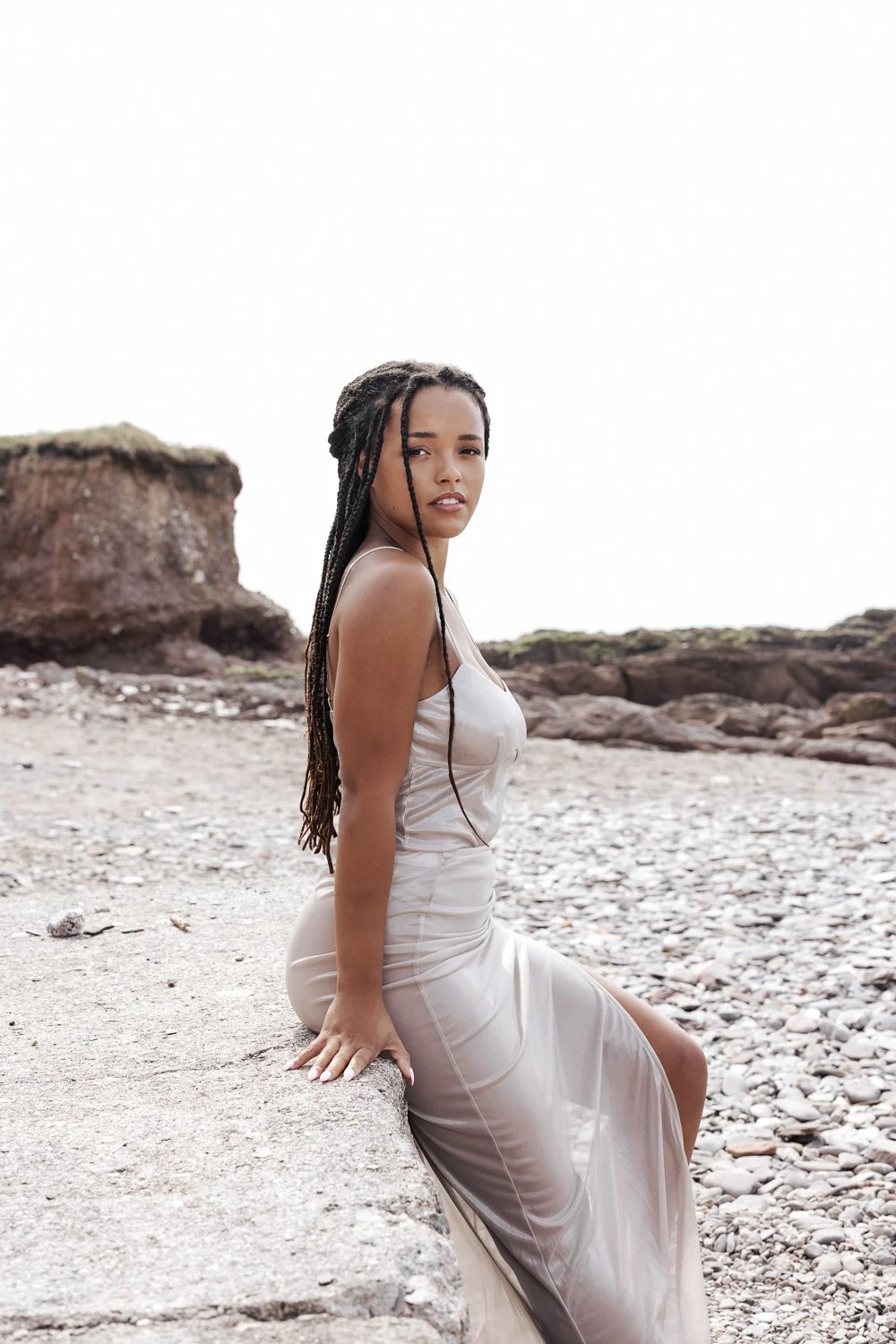 Self love and confidence photography session by Devon photographer in Plymouth, woman at the seaside.