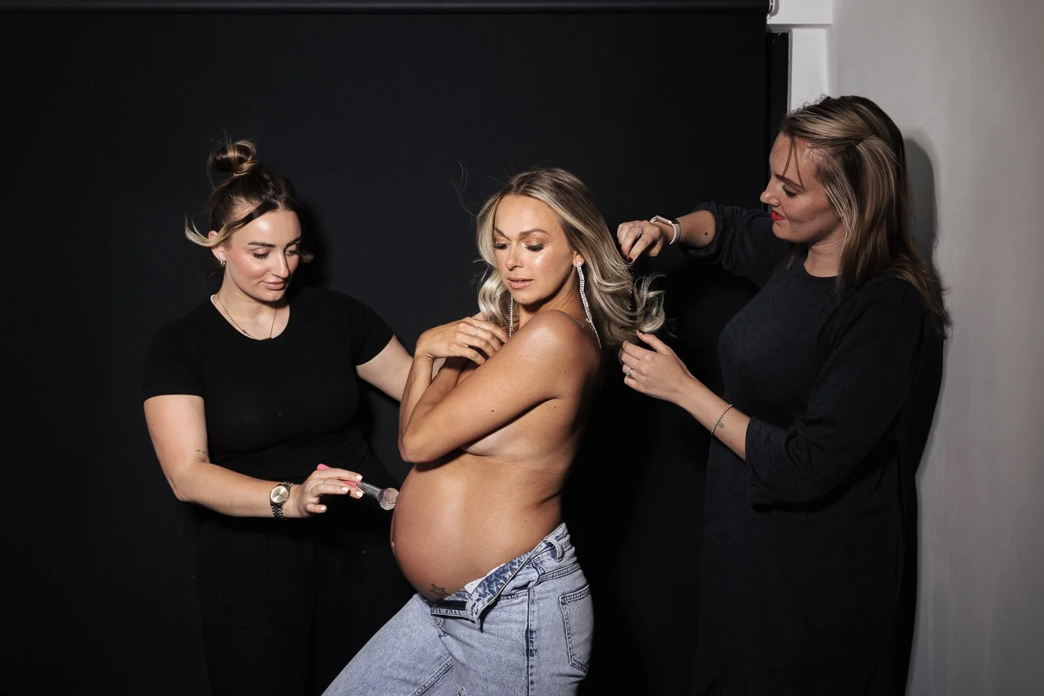 Studio and sunset portraits capture expecting mothers in styled outfits, professional hair & makeup, and timeless, memorable images.