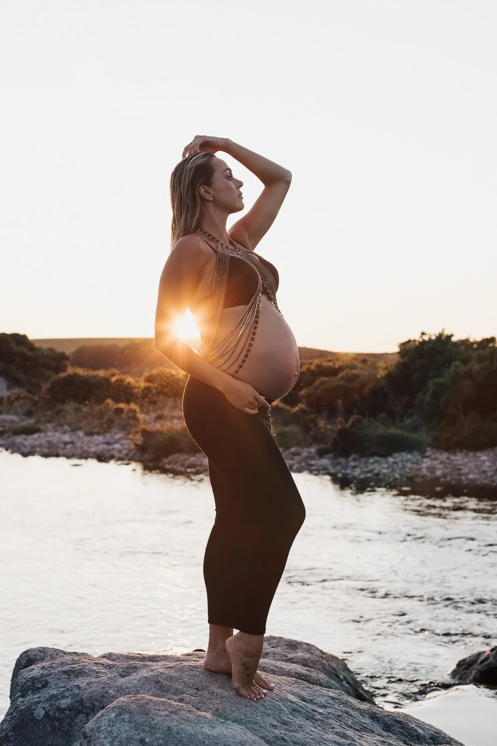 Studio and sunset portraits capture expecting mothers in styled outfits, professional hair & makeup, and timeless, memorable images.