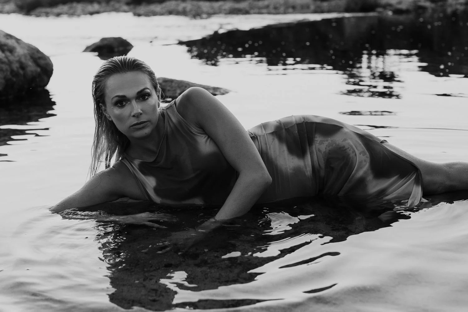 Studio and sunset portraits capture expecting mothers in styled outfits, professional hair & makeup, and timeless, memorable images.