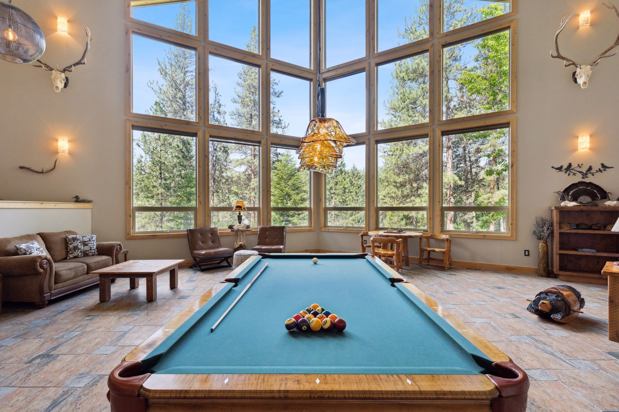 The Lodge at Forest Grove | Missoula Montana Fly Fishing Lodge | Lodges game room pool table and elk skulls.jpeg