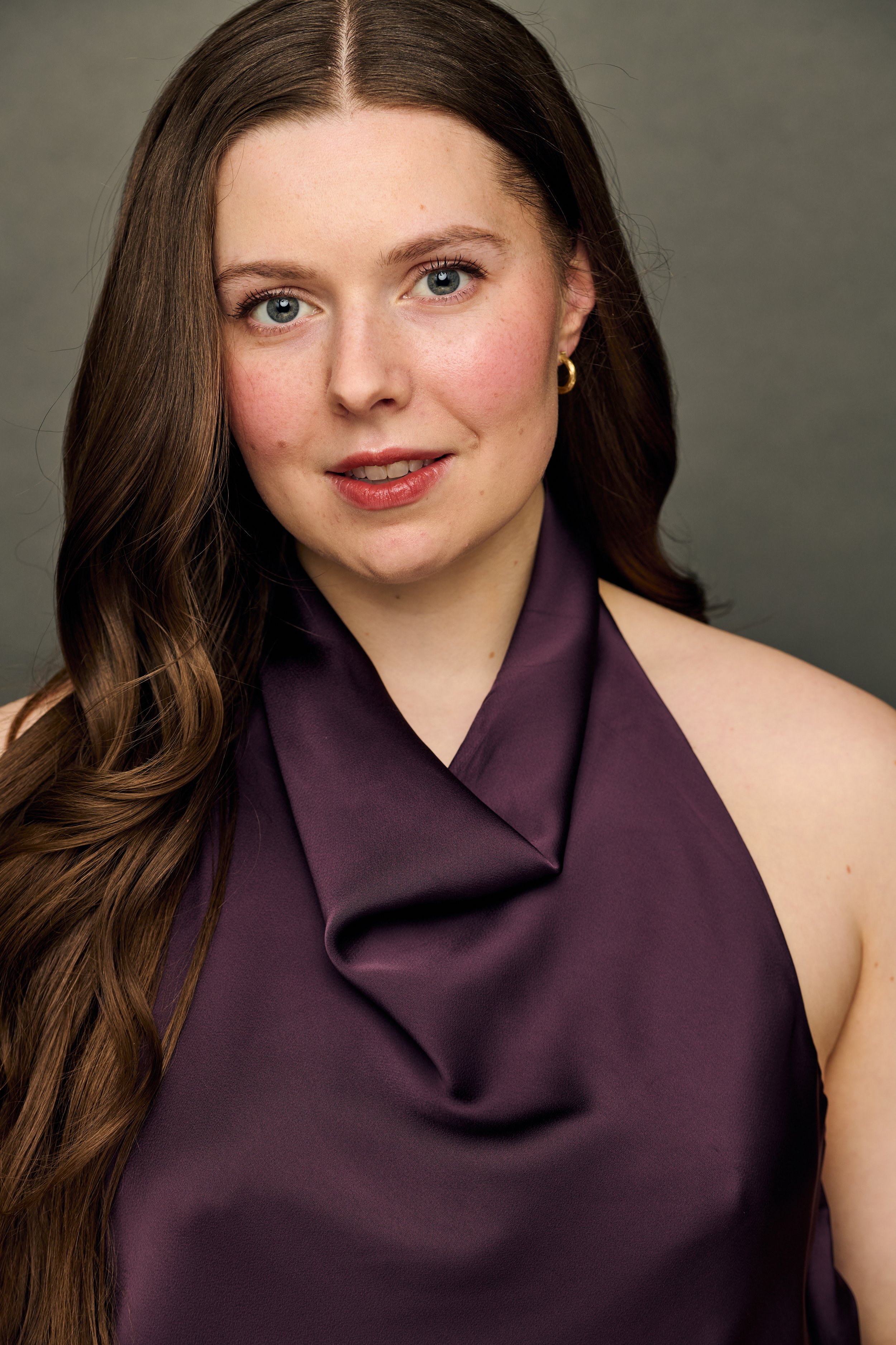 Hanna Scotch_Headshot_Purple 1.JPG