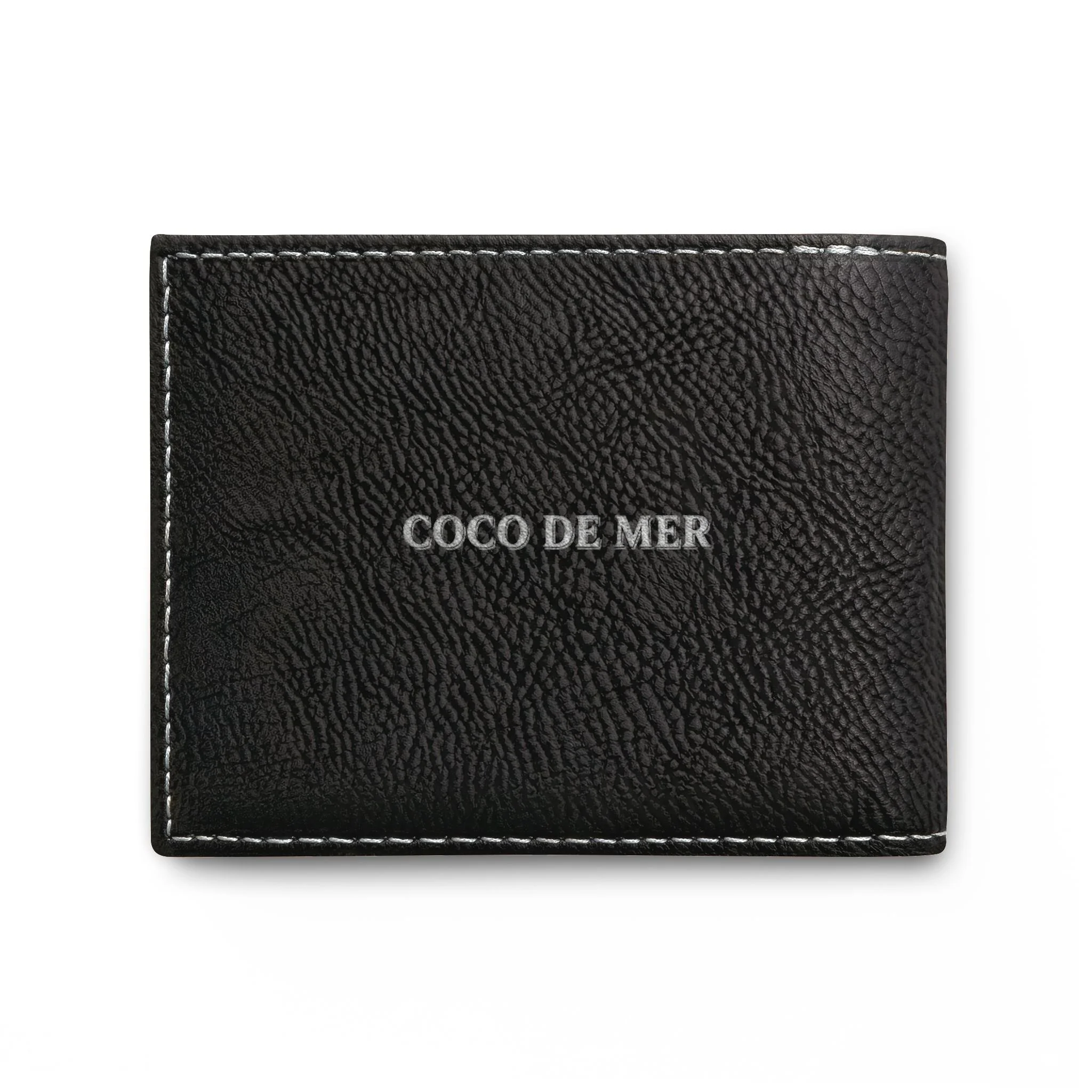 Back view of black pebbled vegan leather wallet engraved with Silver Coco De Mer lettering