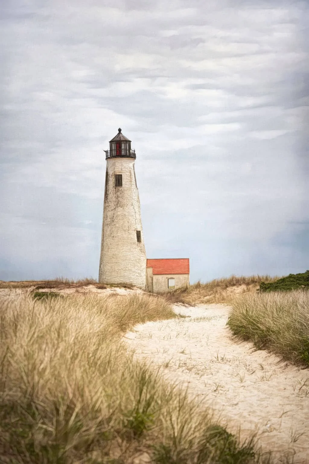 HISTORIC GREAT POINT LIGHTHOUSE, NANTUCKET PHOTO WITH SANDY PATH AND COASTAL GRASSES UNDER CLOUDY SKY