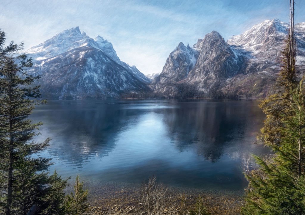 JENNY LAKE WITH SNOW-CAPPED PEAKS IN GRAND TETON NATIONAL PARK
