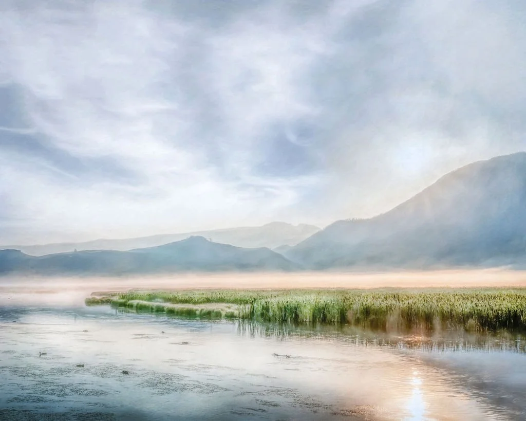 NATIONAL ELK REFUGE - JACKSON HOLE, WYOMING - MISTY MORNING OVER WETLANDS AND MOUNTAINS