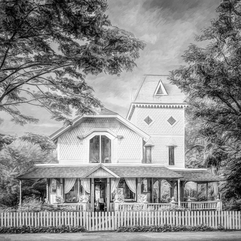 a black and white photo of a beautiful victorian home on Martha's Vineyard