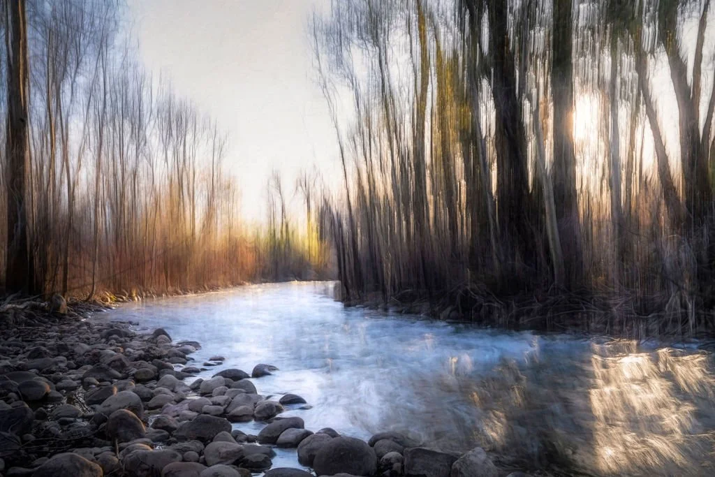 DRIFTING LIGHT ALONG THE RIVER BEND 