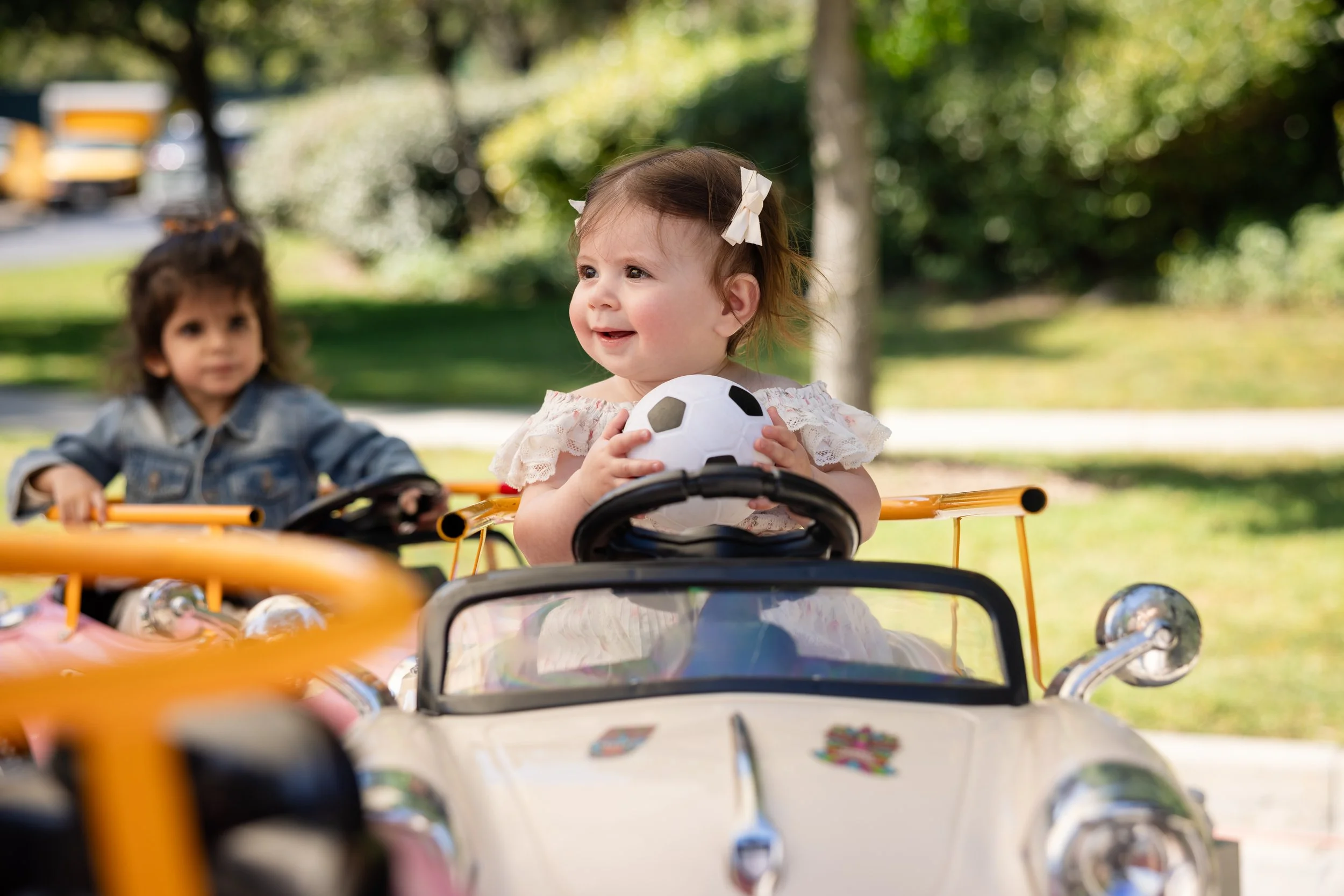 Child celebrating at an outdoor birthday party
