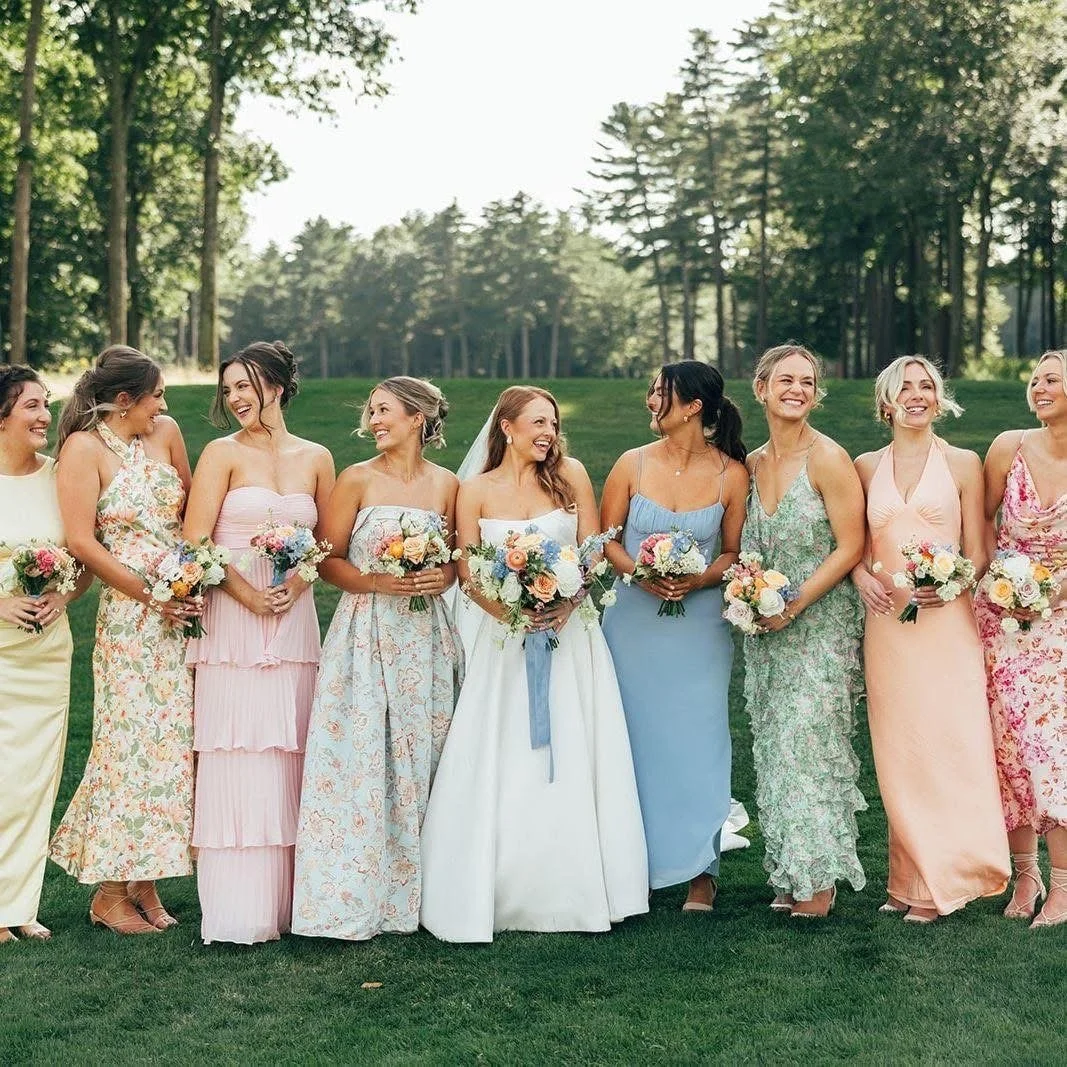 Wedding party celebrating with the newlyweds at an outdoor Los Angeles ceremony