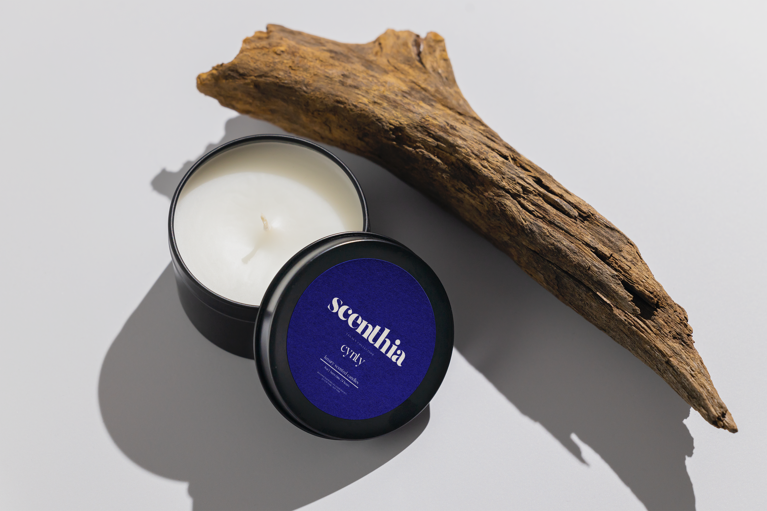 SCENTHIA Black_Tin_Candle_Mockup copy.png