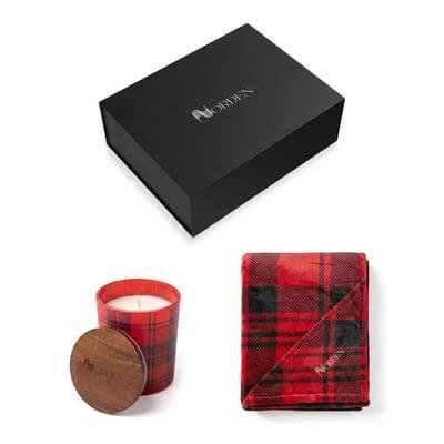 Cottage Classic gift set with folded blanket and candle presented together.