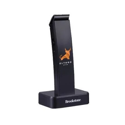 Cordless hair trimmer shown with its grooming attachments.