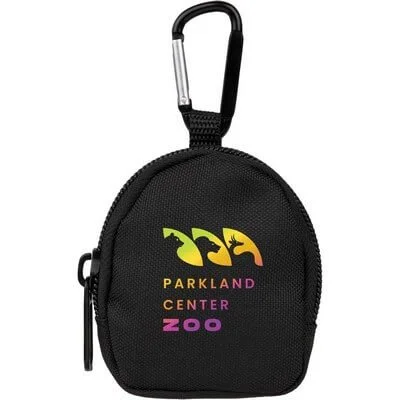 Mini backpack bag charm clipped to a larger tote.