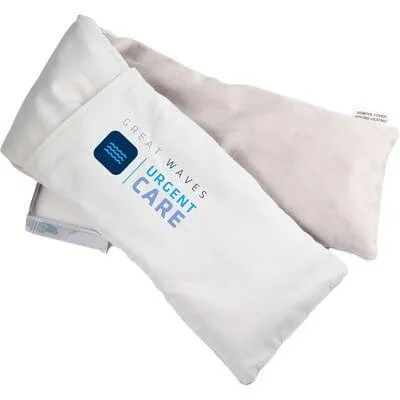 Flaxseed heating pad folded to show its fabric cover and size.