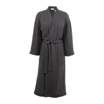 Cotton robe hanging neatly with belt tied.