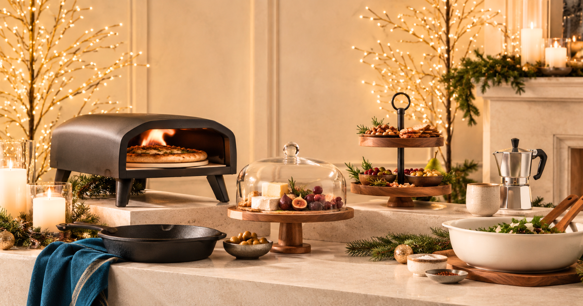 Holiday gifts for foodies and entertainers featuring a pizza oven, serving pieces, coffee accessories, cookware, and gourmet treats.