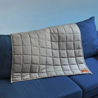 Weighted blanket folded to show its texture and construction.