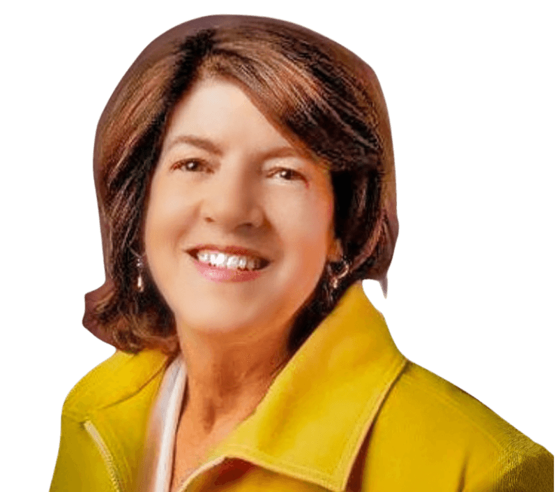 Victoria Fine, co-owner of Fine Promotions, wearing a yellow jacket and smiling. She and her husband, Robb Fine, run the company specializing in promotional products and branded apparel.