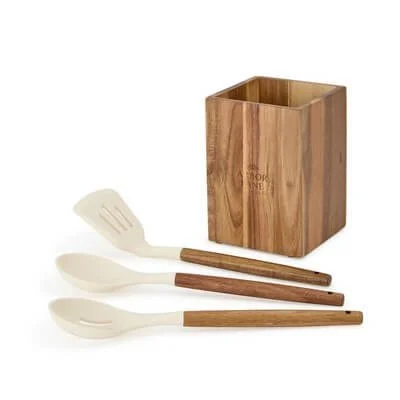 Kitchen canister holding its coordinated utensils.