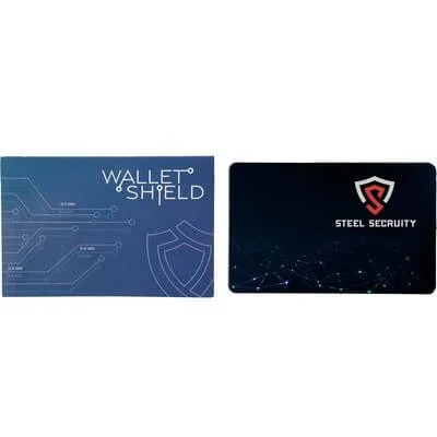 Slim wallet shield positioned beside payment cards.