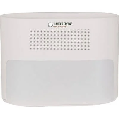 Sunrise alarm clock illuminated on a bedside table.