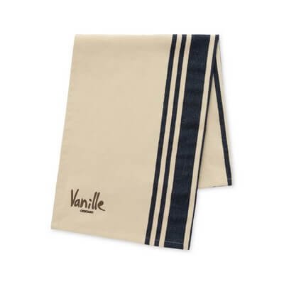 Cotton kitchen towel folded to show its texture and hanging loop.